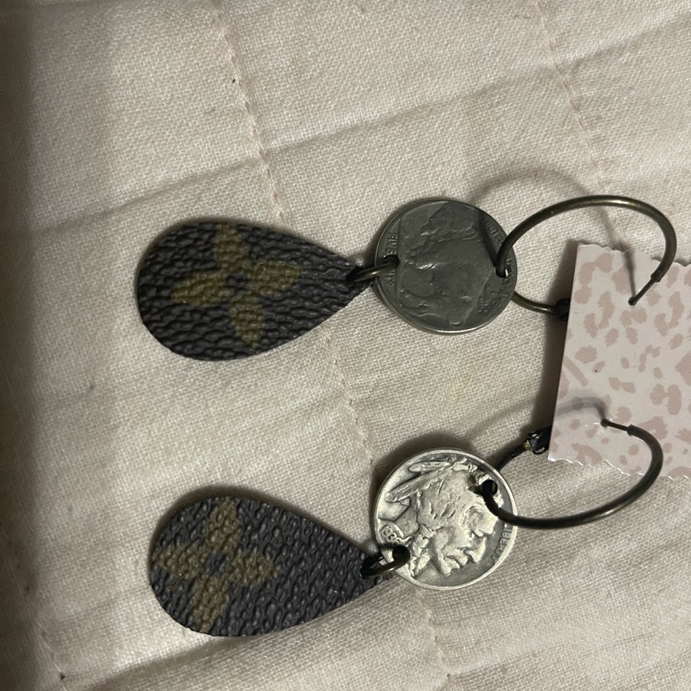 Upscale Louis Vuitton bison Nickel earrings